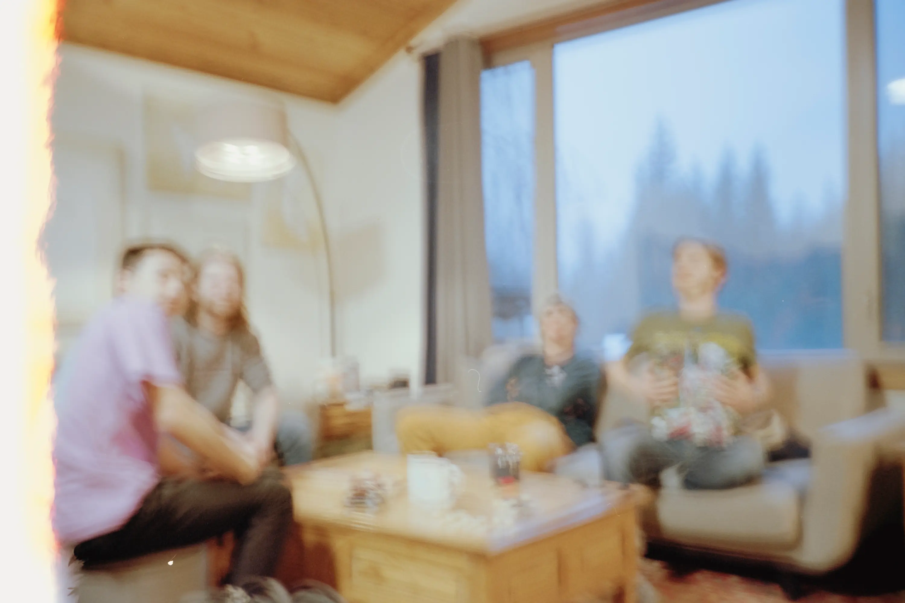 My friends hanging out in a cabin